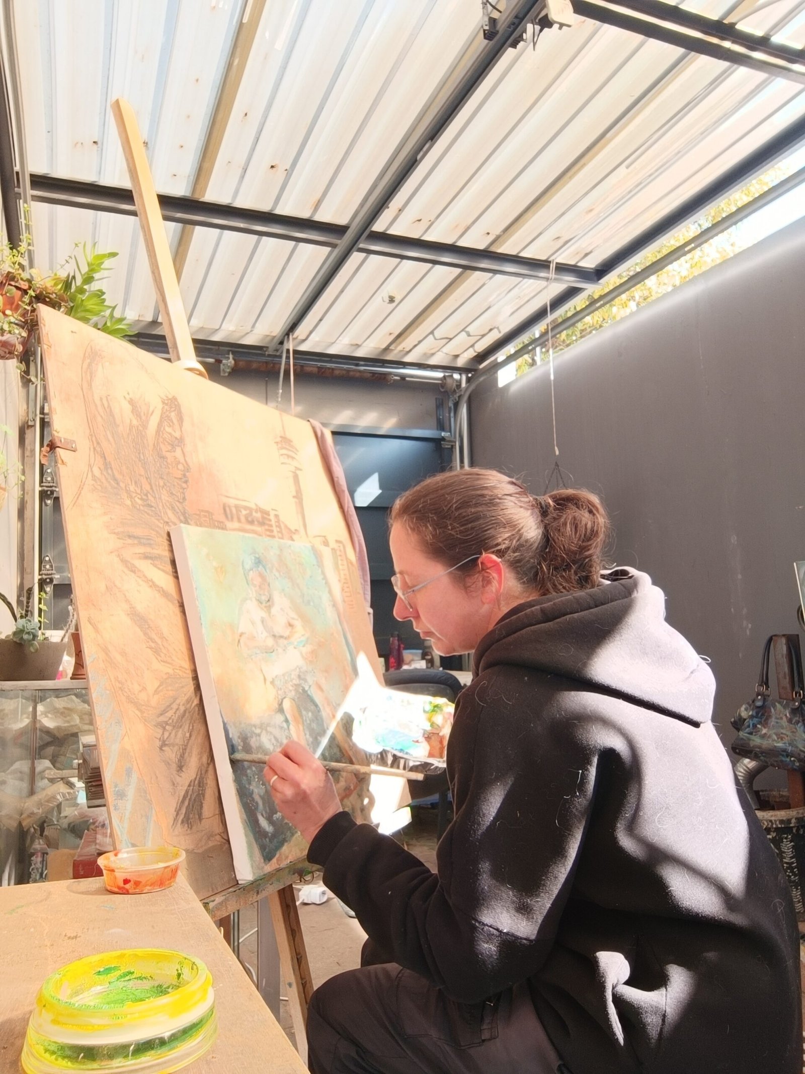 Lucille Fernandes-Stangl painting in her recovery art studio, Johannesburg
